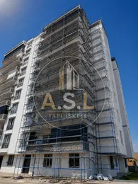 ASL YAPI · Batman iskele hizmetleri — Sıvalı yüksek bina cephesindeki iskele uygulaması
